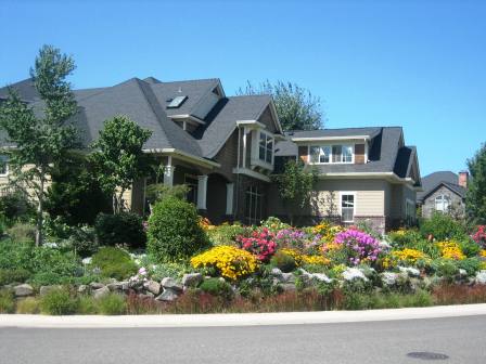 A fine Vancouver WA Home in the spring time with flowers in full bloom. Photo of Vancouver home taken by John Slocum, REMAX Vancouver WA.